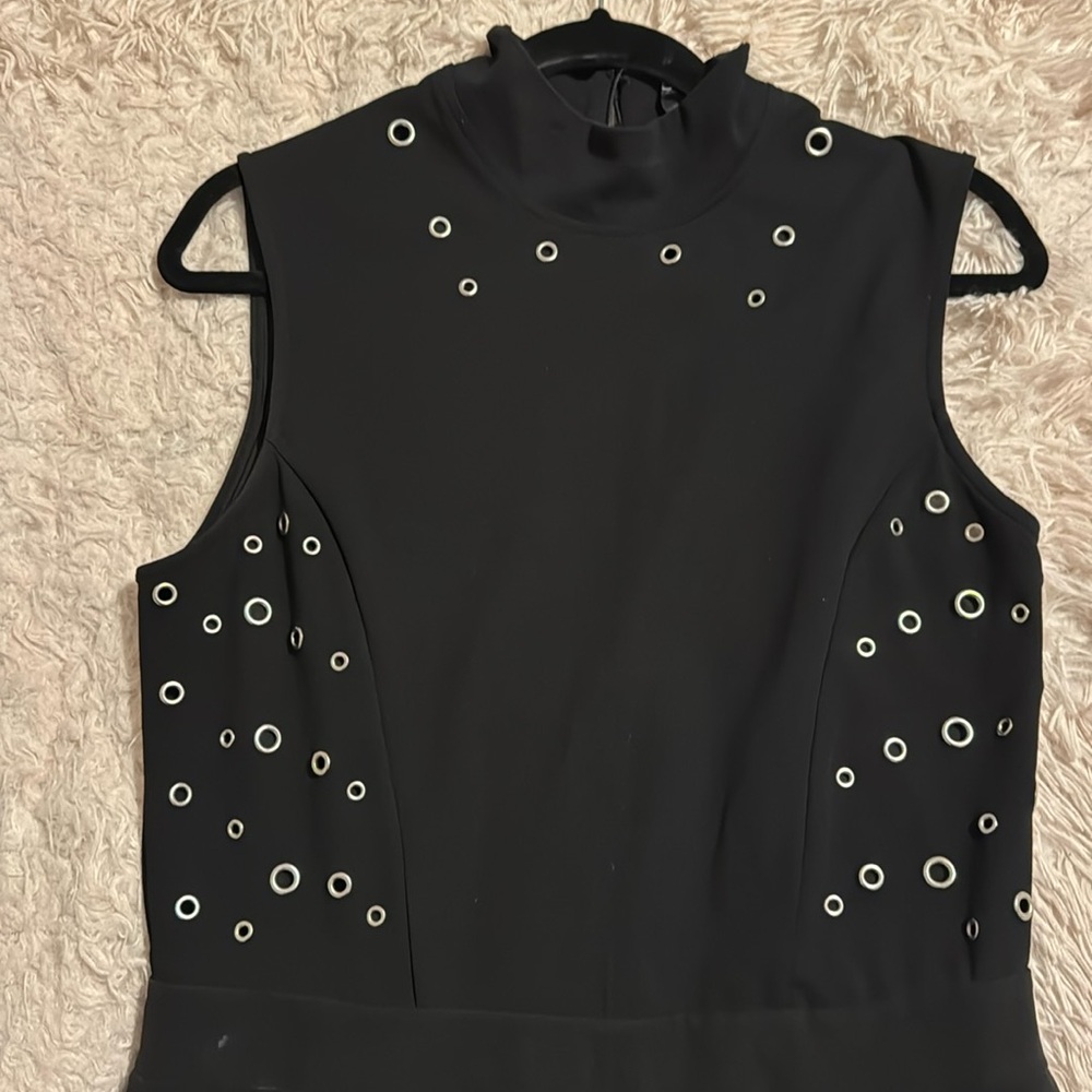 Black jumpsuit with metal details from XOXO size XL